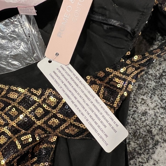 Romeo and Juliet Couture Sleeveless Sequined Black and Gold, Party Dress. - Picture 13 of 14